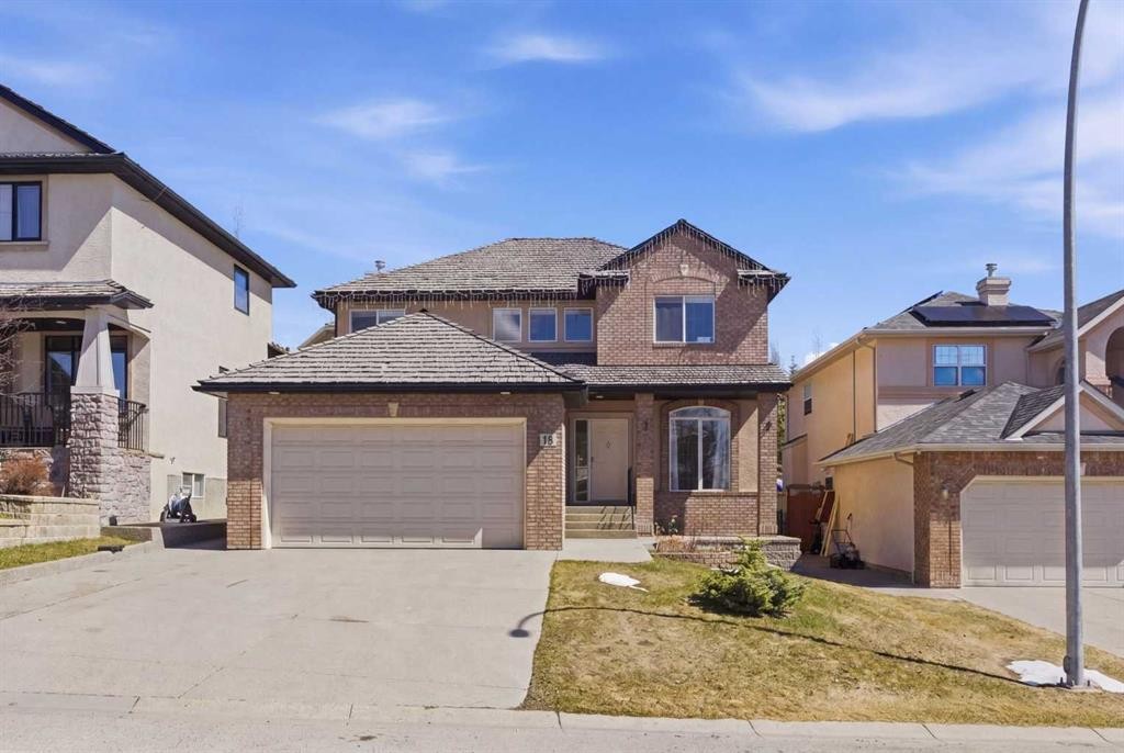 18 Royal Crest Way Nw, Calgary, AB - Outdoor With Facade