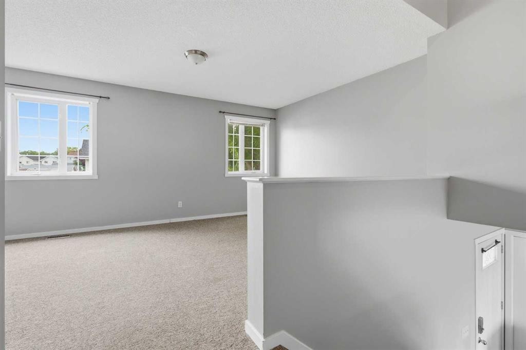 129 Hidden Spring Circle Nw, Calgary, AB - Indoor Photo Showing Other Room