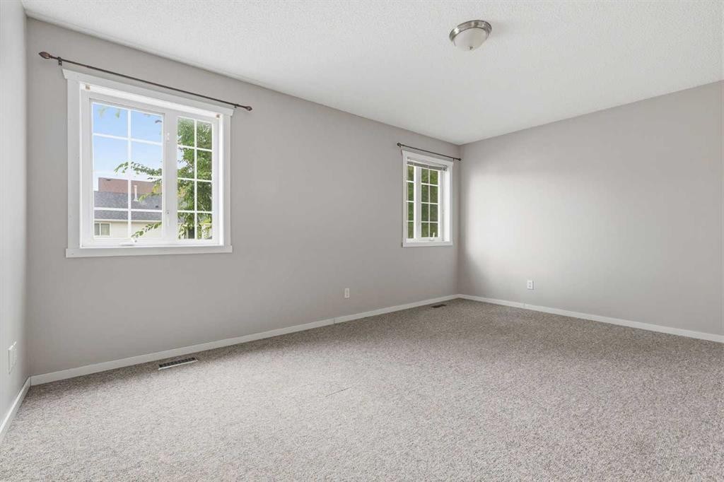 129 Hidden Spring Circle Nw, Calgary, AB - Indoor Photo Showing Other Room