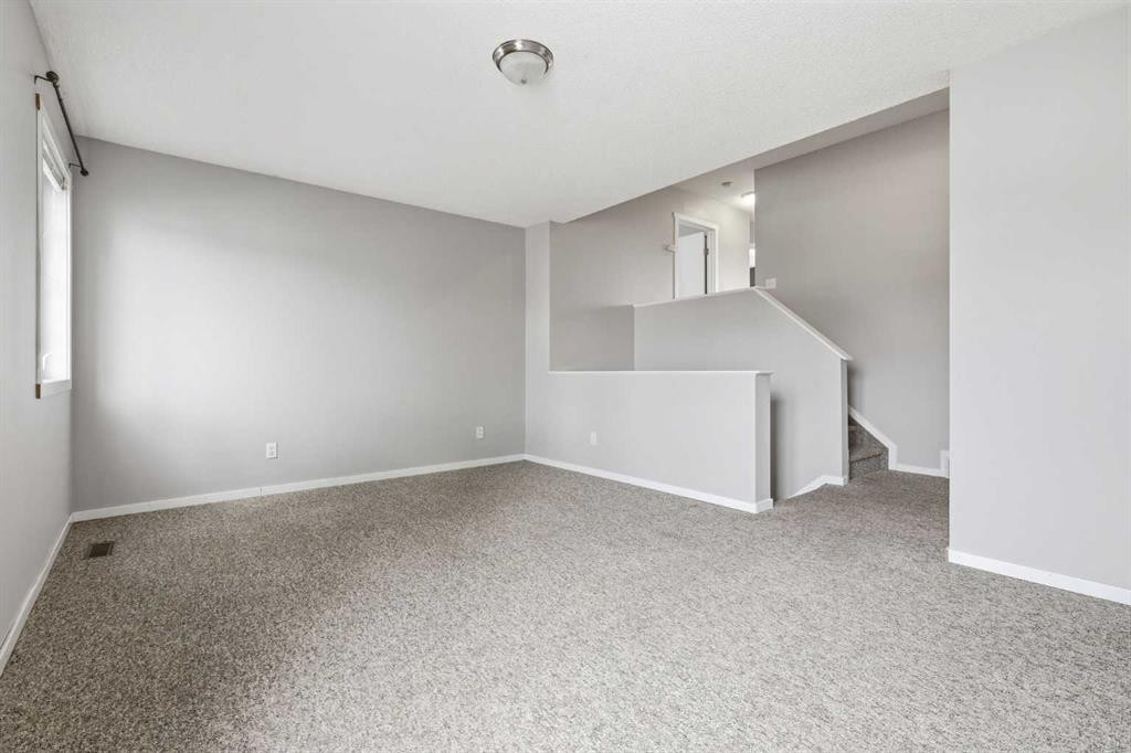 129 Hidden Spring Circle Nw, Calgary, AB - Indoor Photo Showing Other Room