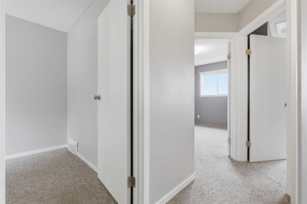 129 Hidden Spring Circle Nw, Calgary, AB - Indoor Photo Showing Other Room