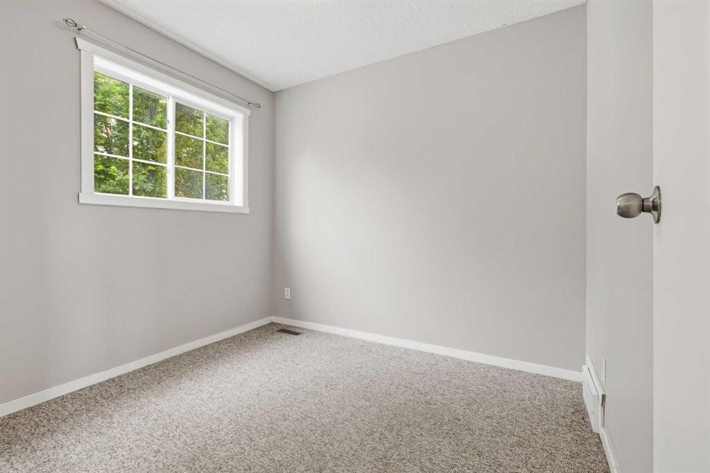 129 Hidden Spring Circle Nw, Calgary, AB - Indoor Photo Showing Other Room