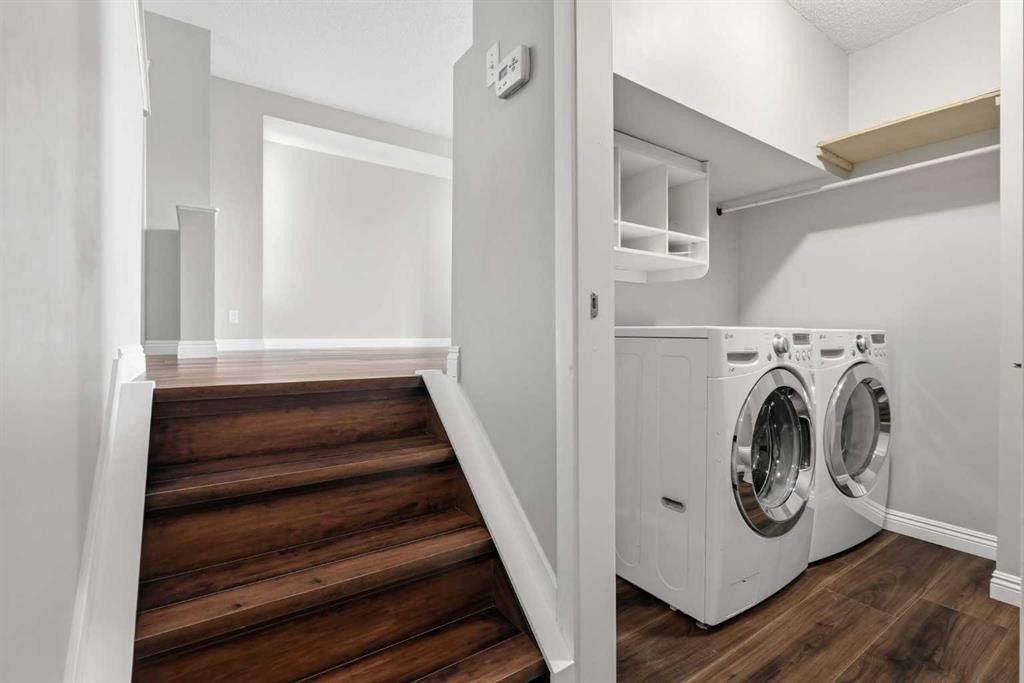 129 Hidden Spring Circle Nw, Calgary, AB - Indoor Photo Showing Laundry Room