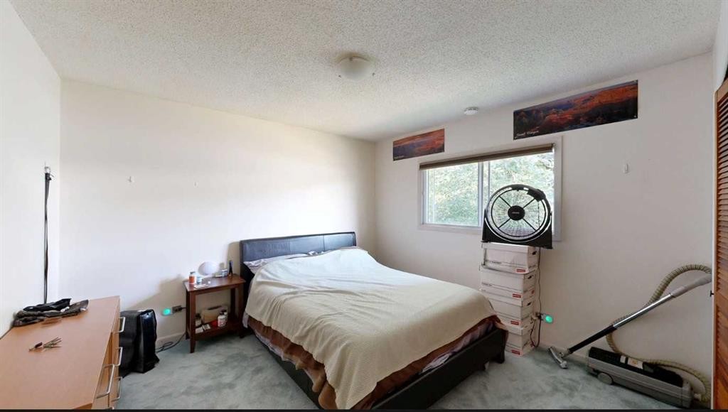 708 55 Avenue Sw, Calgary, AB - Indoor Photo Showing Bedroom
