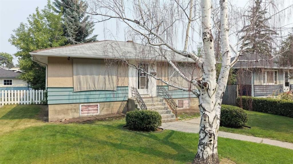 708 55 Avenue Sw, Calgary, AB - Outdoor