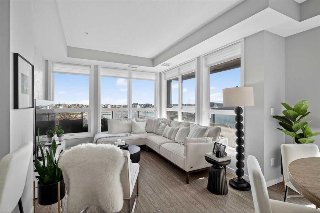 302-2231 Mahogany Boulevard Se, Calgary, AB - Indoor Photo Showing Living Room