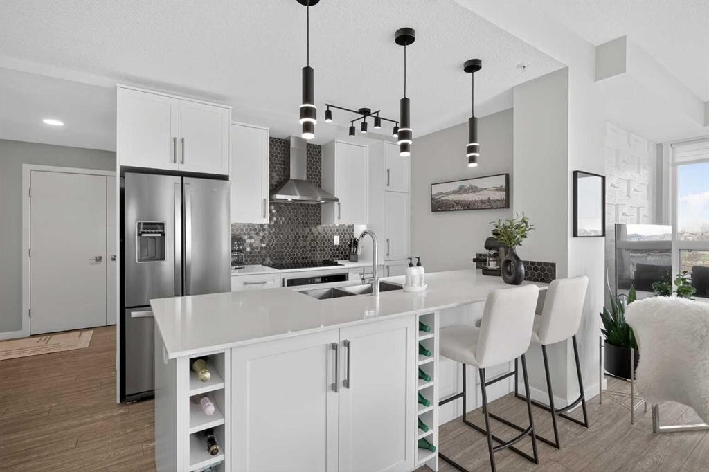 302-2231 Mahogany Boulevard Se, Calgary, AB - Indoor Photo Showing Kitchen With Upgraded Kitchen