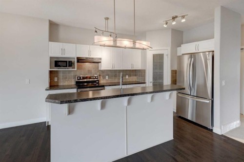 103 Bridle Estates Mews Sw, Calgary, AB - Indoor Photo Showing Kitchen With Stainless Steel Kitchen With Upgraded Kitchen