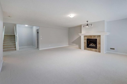 103 Bridle Estates Mews Sw, Calgary, AB - Indoor With Fireplace