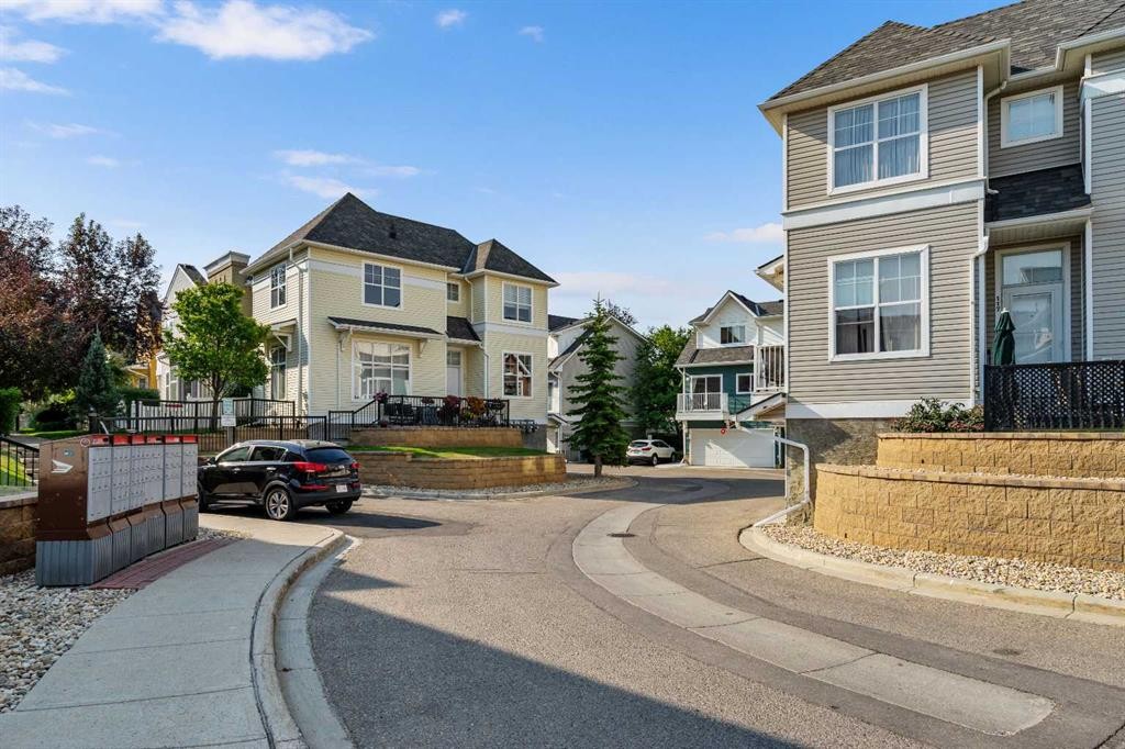 205 Mckenzie Towne Gate Se, Calgary, AB - Outdoor With Facade