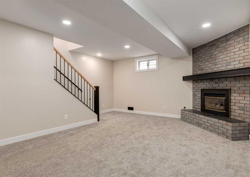 7956 71 Avenue Nw, Calgary, AB - Indoor With Fireplace