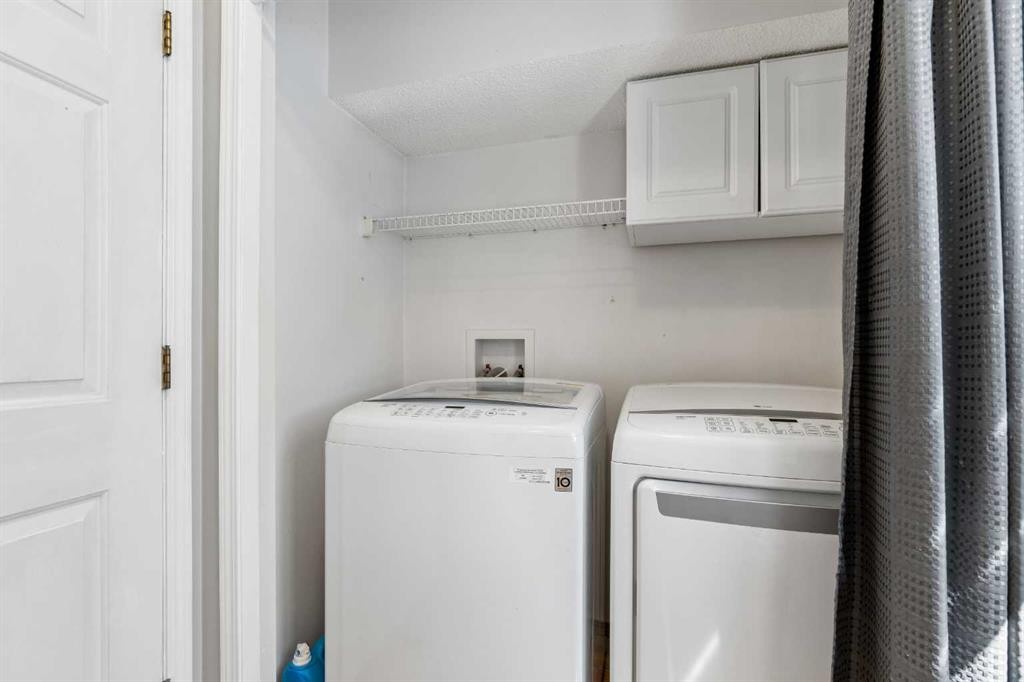 10433 Hidden Valley Drive Nw, Calgary, AB - Indoor Photo Showing Laundry Room