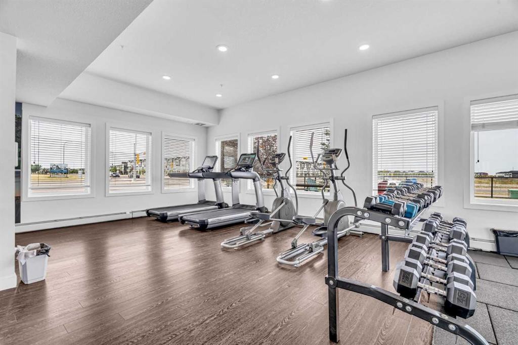 1119-76 Cornerstone Passage Ne, Calgary, AB - Indoor Photo Showing Gym Room