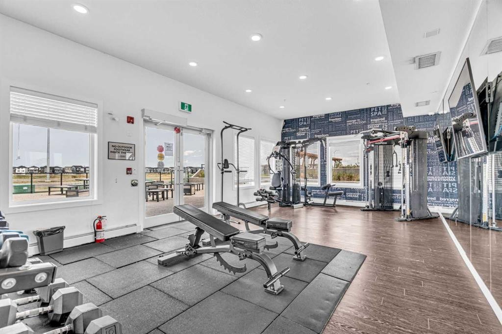 1119-76 Cornerstone Passage Ne, Calgary, AB - Indoor Photo Showing Gym Room