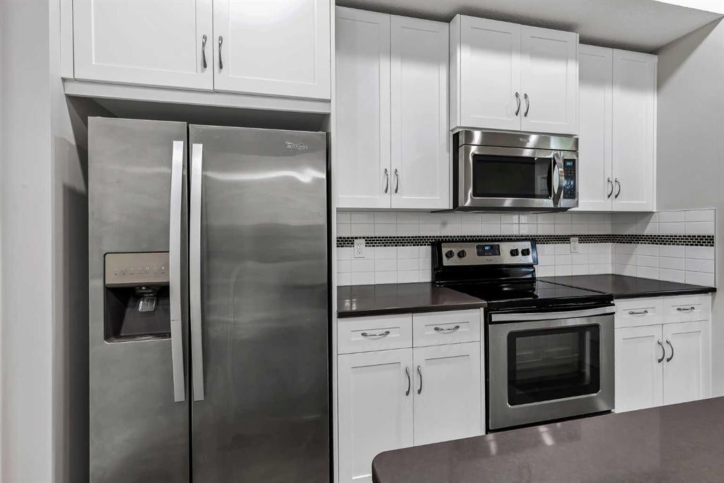540 Evanston Link Nw, Calgary, AB - Indoor Photo Showing Kitchen With Stainless Steel Kitchen With Upgraded Kitchen