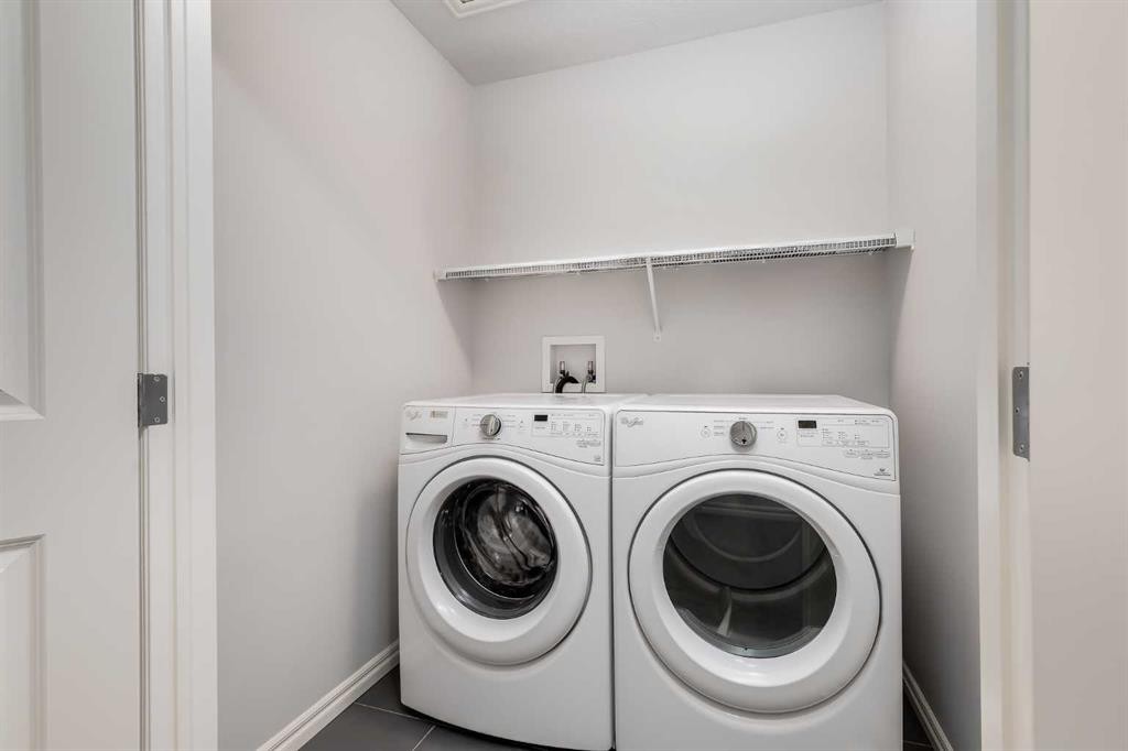 540 Evanston Link Nw, Calgary, AB - Indoor Photo Showing Laundry Room