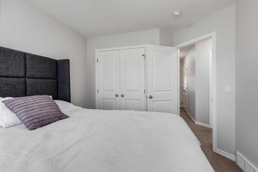 540 Evanston Link Nw, Calgary, AB - Indoor Photo Showing Bedroom