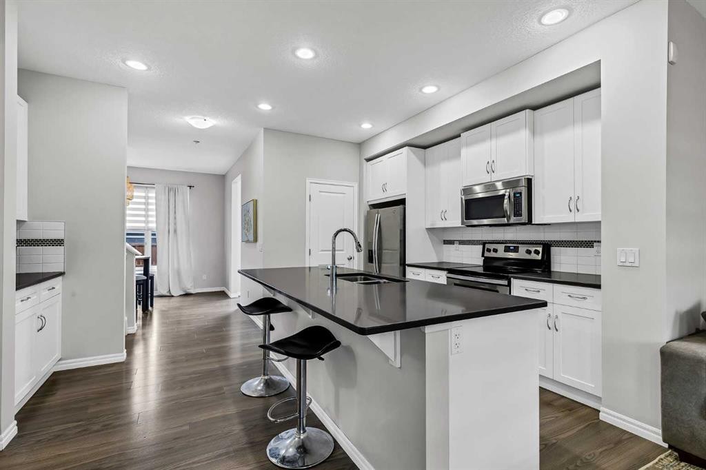 540 Evanston Link Nw, Calgary, AB - Indoor Photo Showing Kitchen With Stainless Steel Kitchen With Upgraded Kitchen
