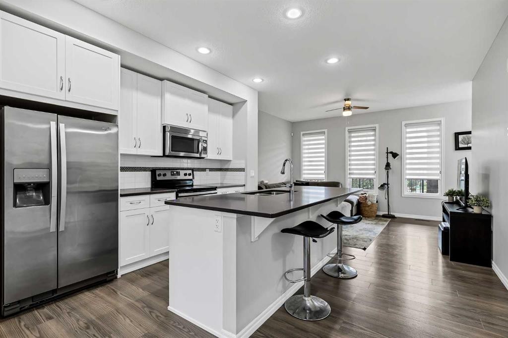 540 Evanston Link Nw, Calgary, AB - Indoor Photo Showing Kitchen With Stainless Steel Kitchen With Upgraded Kitchen
