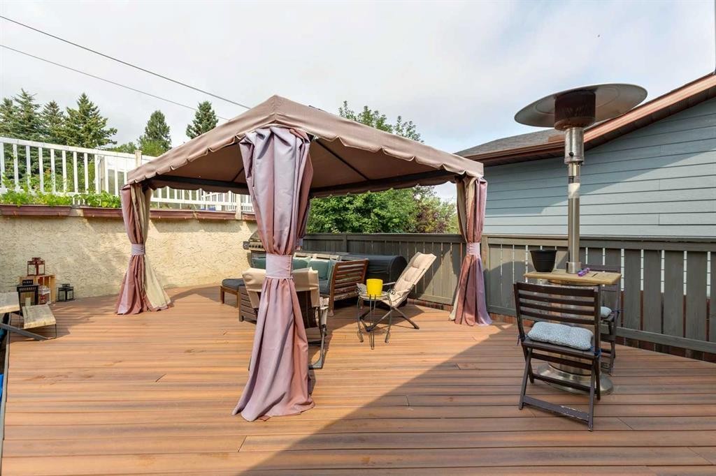 107 Bermuda Drive Nw, Calgary, AB - Outdoor With Deck Patio Veranda With Exterior
