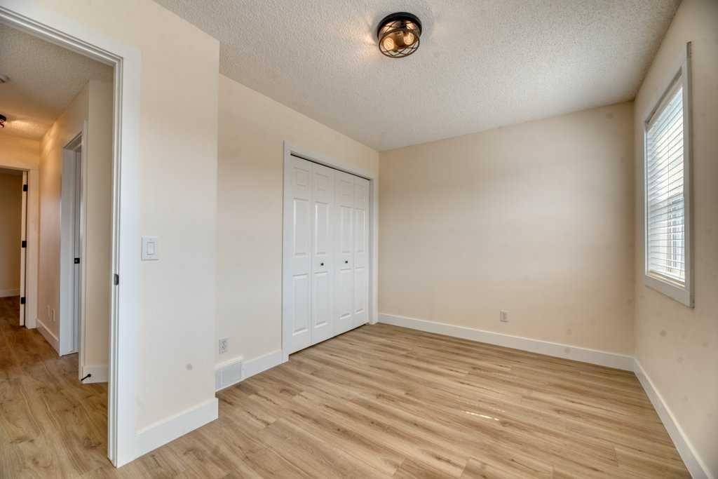 20 Taracove Crescent Ne, Calgary, AB - Indoor Photo Showing Other Room