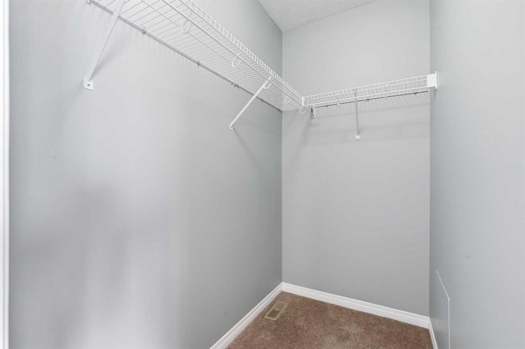 149 Prestwick Villas Se, Calgary, AB - Indoor With Storage