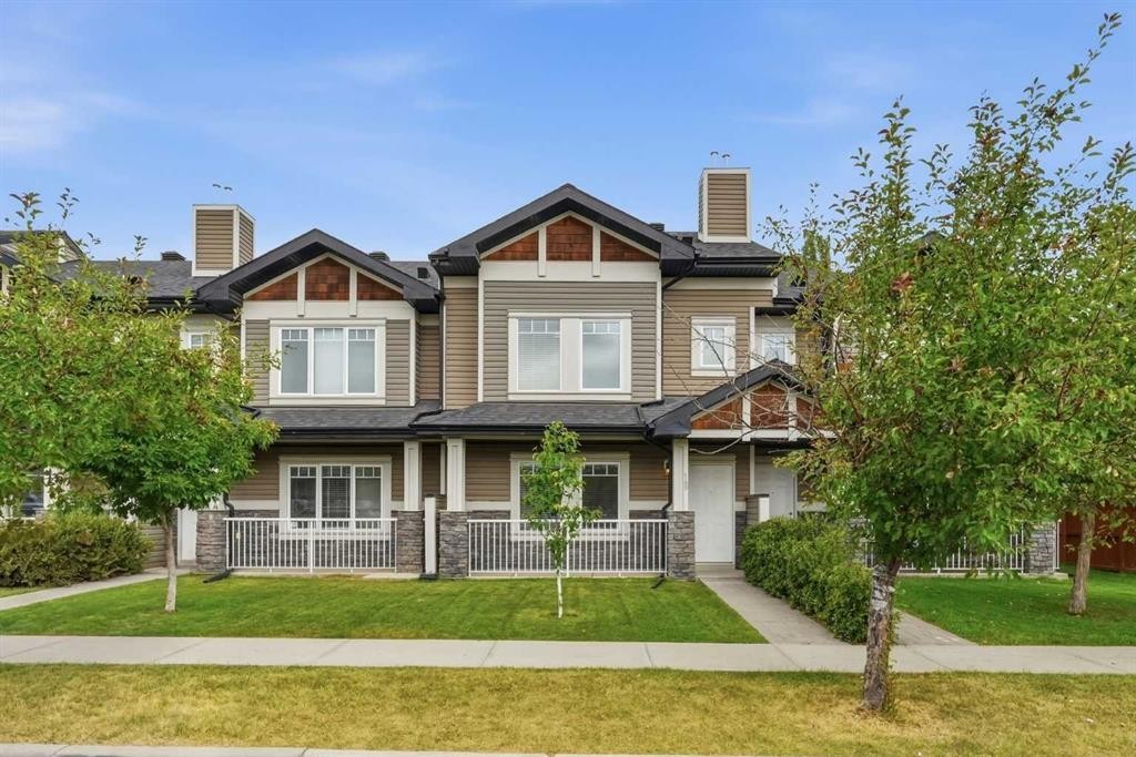 149 Prestwick Villas Se, Calgary, AB - Outdoor With Deck Patio Veranda With Facade