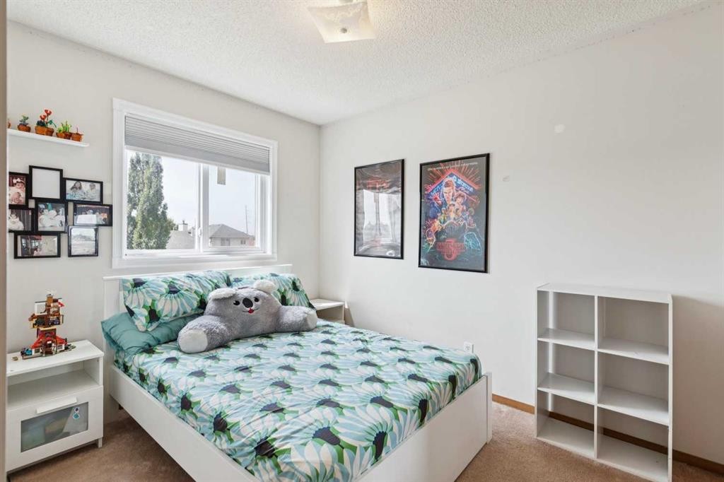 151 Rivercrest Close Se, Calgary, AB - Indoor Photo Showing Bedroom