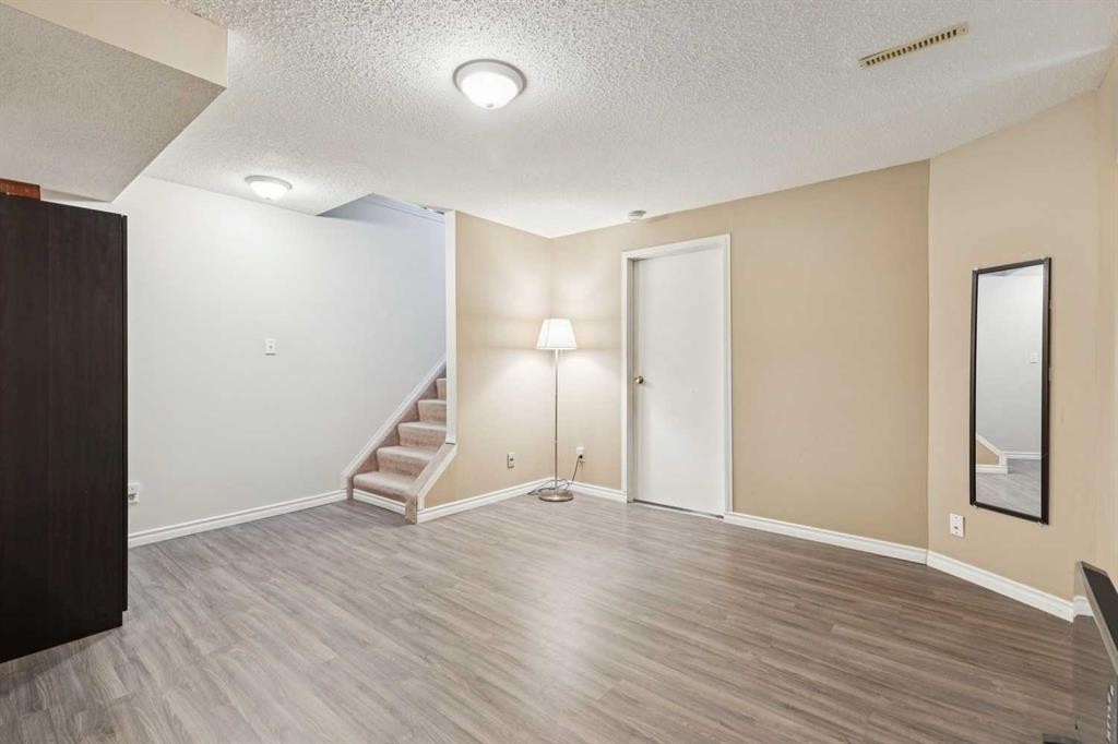 151 Rivercrest Close Se, Calgary, AB - Indoor Photo Showing Other Room