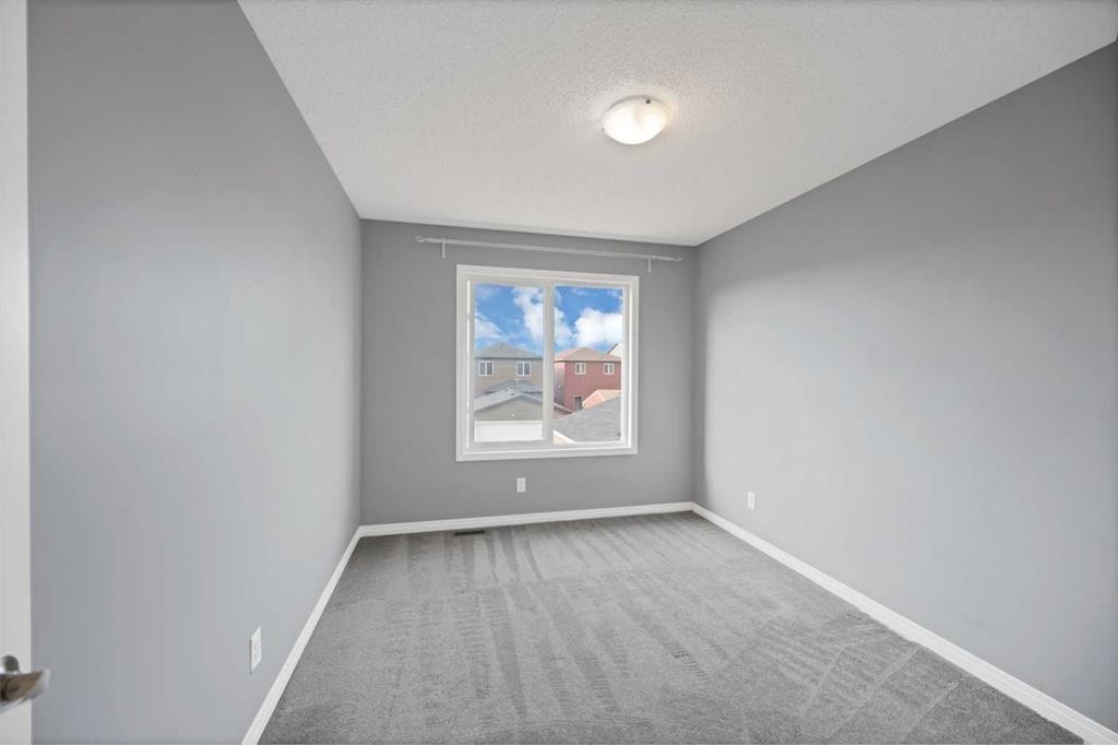 281 Cornerstone Passage Ne, Calgary, AB - Indoor Photo Showing Other Room