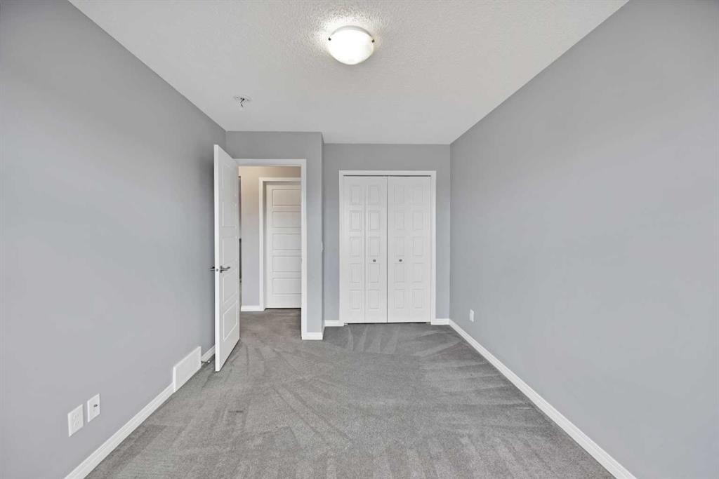 281 Cornerstone Passage Ne, Calgary, AB - Indoor Photo Showing Other Room
