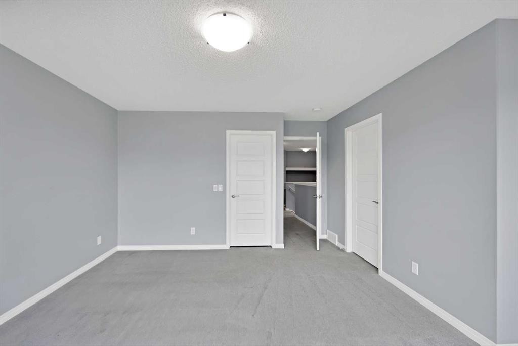 281 Cornerstone Passage Ne, Calgary, AB - Indoor Photo Showing Other Room