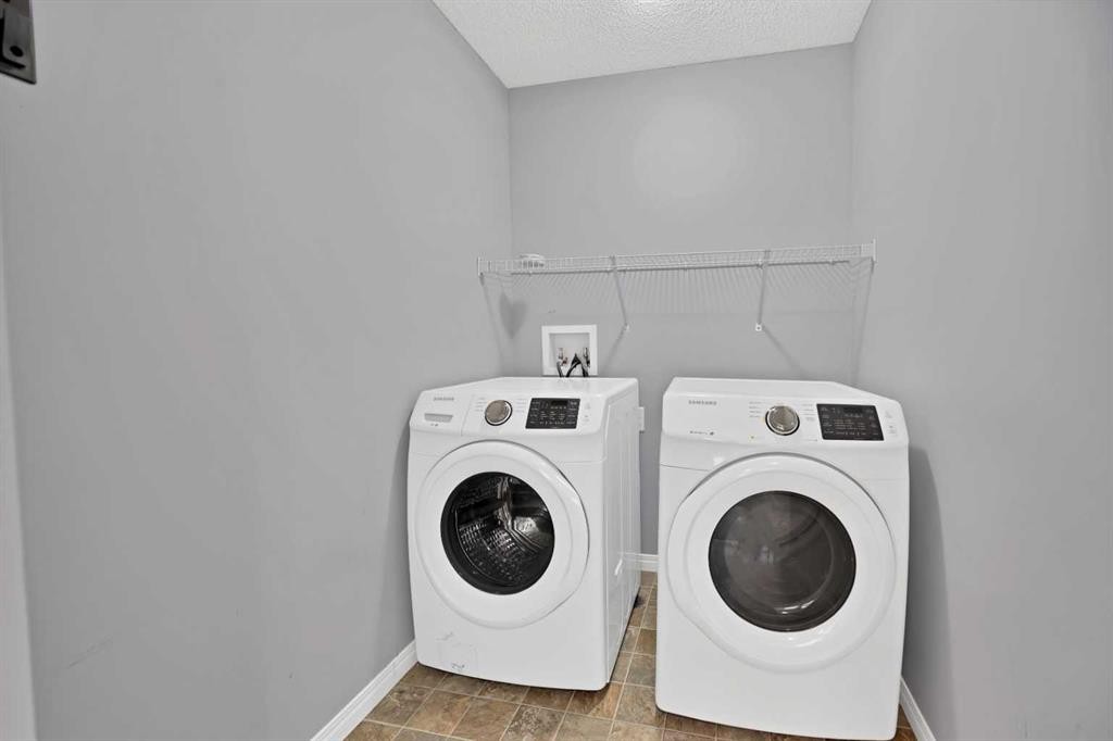 281 Cornerstone Passage Ne, Calgary, AB - Indoor Photo Showing Laundry Room