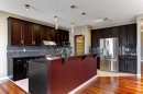 406 Silverado Boulevard Sw, Calgary, AB  - Indoor Photo Showing Kitchen With Upgraded Kitchen 