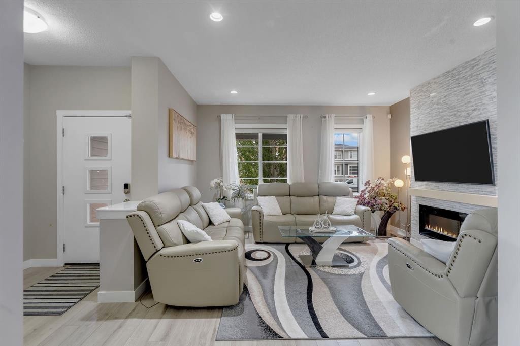 160 Cornerstone Avenue Ne, Calgary, AB - Indoor Photo Showing Living Room With Fireplace
