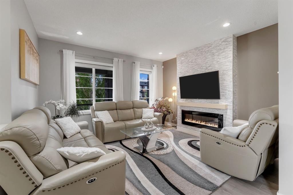 160 Cornerstone Avenue Ne, Calgary, AB - Indoor Photo Showing Living Room With Fireplace