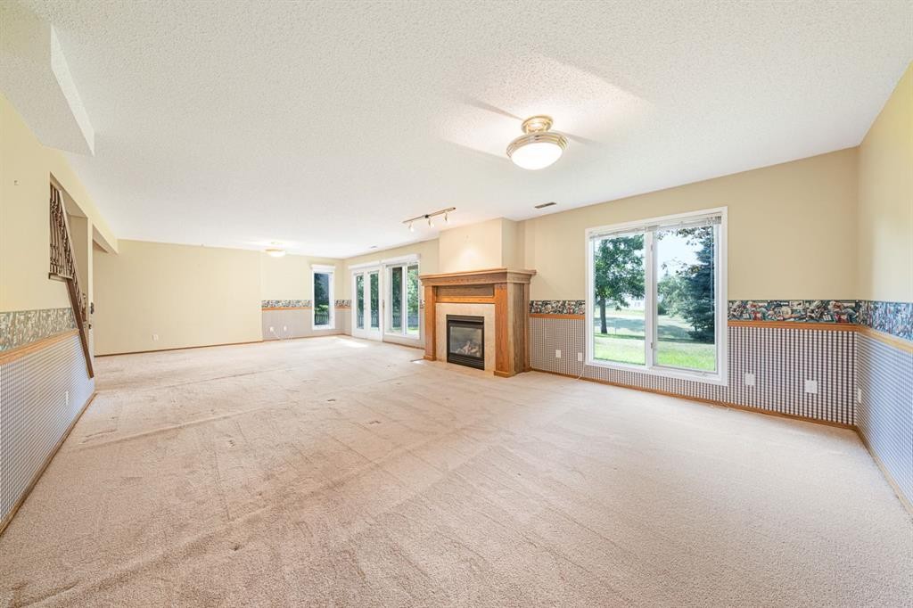 22 Douglas Woods Park Se, Calgary, AB - Indoor With Fireplace
