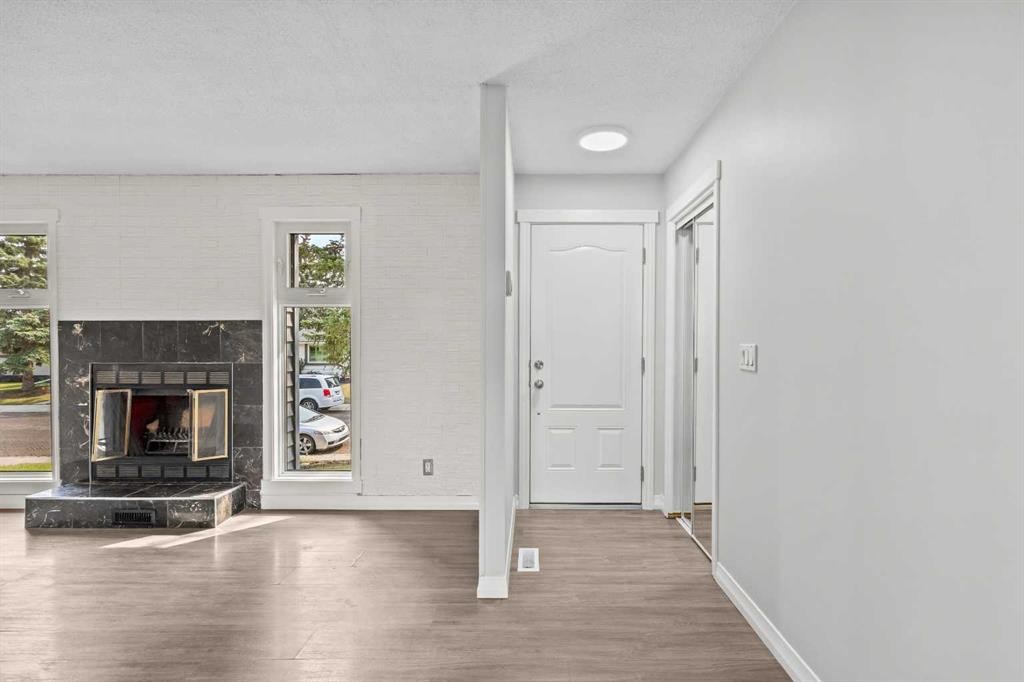 875 Pinecliff Drive Ne, Calgary, AB - Indoor With Fireplace