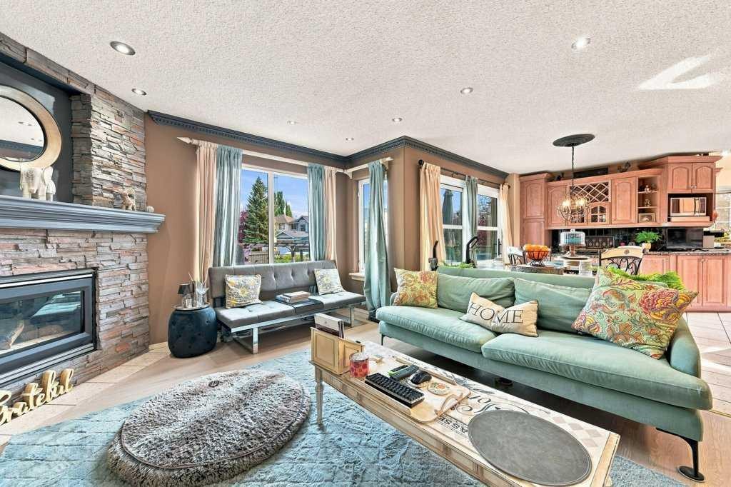 236 Chaparral Drive Se, Calgary, AB - Indoor Photo Showing Living Room With Fireplace