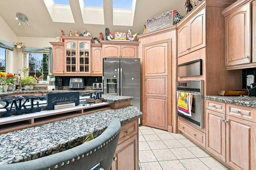 236 Chaparral Drive Se, Calgary, AB - Indoor Photo Showing Kitchen With Upgraded Kitchen