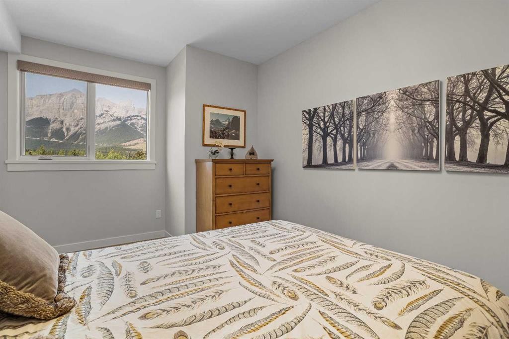 307-1505 Spring Creek Gate, Canmore, AB - Indoor Photo Showing Bedroom