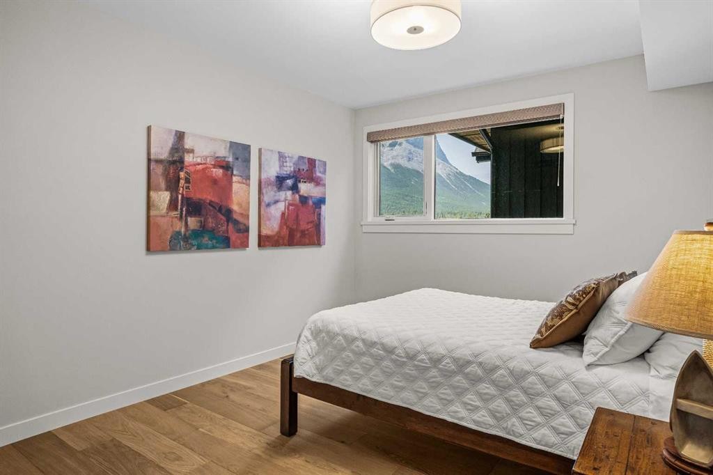 307-1505 Spring Creek Gate, Canmore, AB - Indoor Photo Showing Bedroom