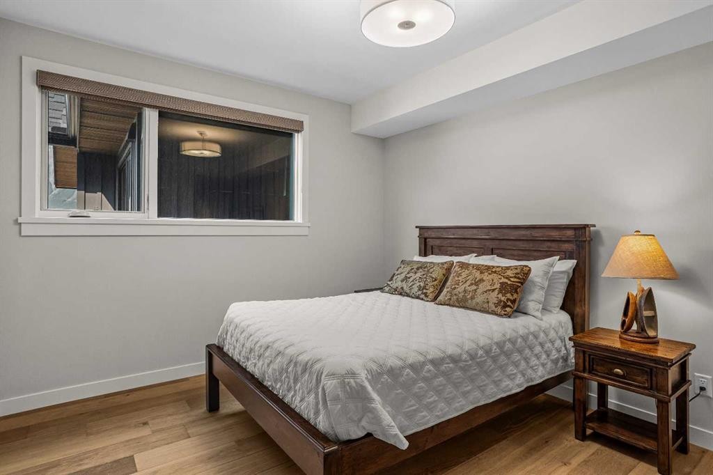 307-1505 Spring Creek Gate, Canmore, AB - Indoor Photo Showing Bedroom