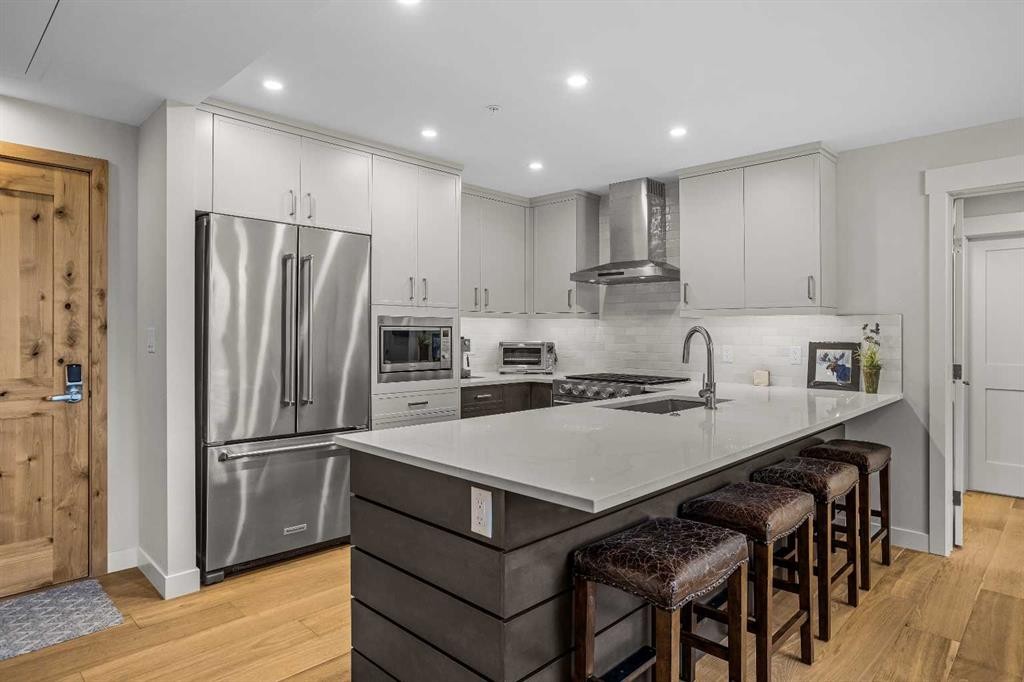 307-1505 Spring Creek Gate, Canmore, AB - Indoor Photo Showing Kitchen With Upgraded Kitchen