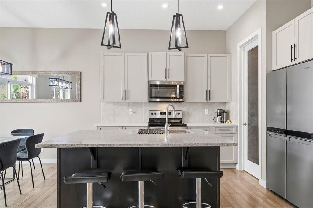 113 Marina Key, Chestermere, AB - Indoor Photo Showing Kitchen With Stainless Steel Kitchen With Upgraded Kitchen