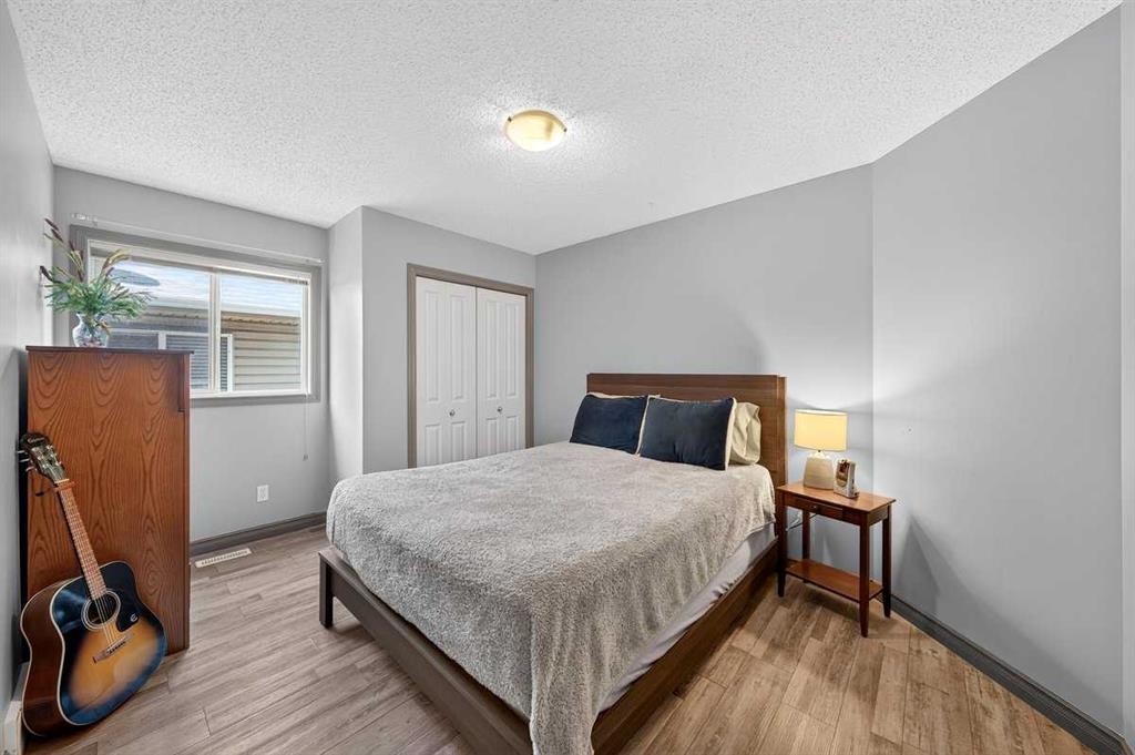 363 Evanston View Nw, Calgary, AB - Indoor Photo Showing Bedroom