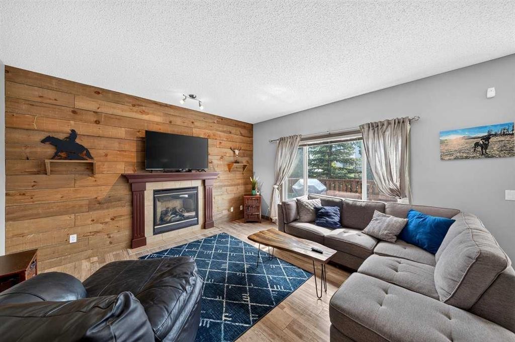 363 Evanston View Nw, Calgary, AB - Indoor Photo Showing Living Room With Fireplace
