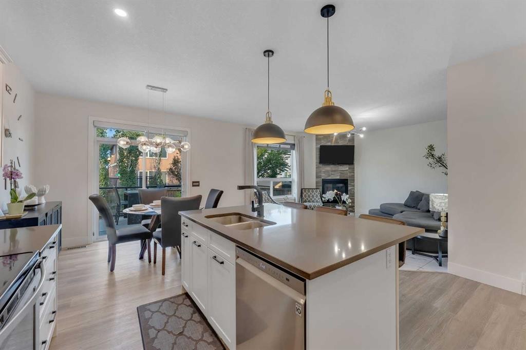 156 Rainbow Falls Heath, Chestermere, AB - Indoor Photo Showing Kitchen With Double Sink With Upgraded Kitchen