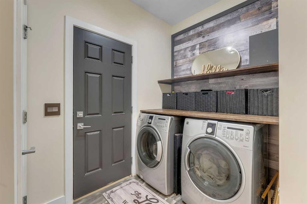 156 Rainbow Falls Heath, Chestermere, AB - Indoor Photo Showing Laundry Room
