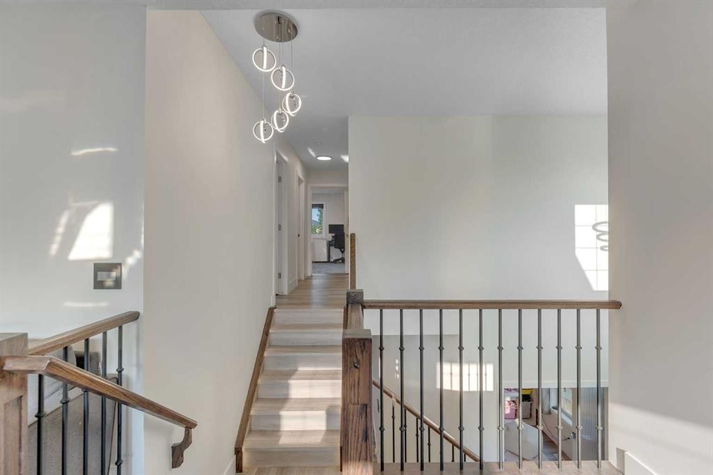 156 Rainbow Falls Heath, Chestermere, AB - Indoor Photo Showing Other Room